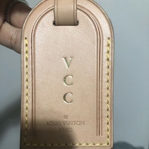 Authentic Louis Vuitton luggage tag
